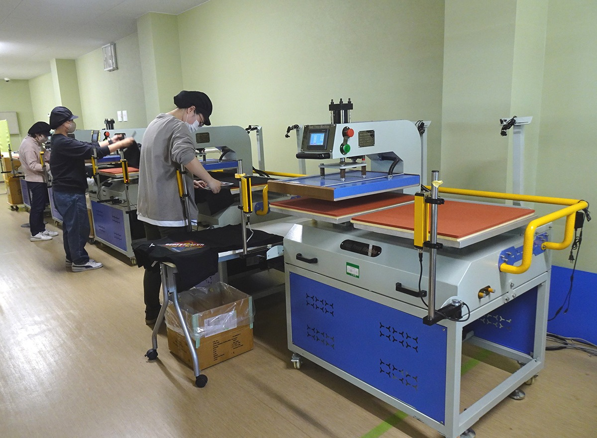 Press work in the next room across the partition